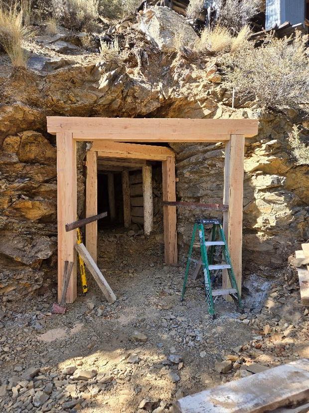 A ladder next to a hole in the ground  AI-generated content may be incorrect.